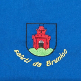 Blaue Sch�rze mit Motiv "Saluti da Brunico"