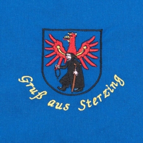 Blaue Sch�rze mit Motiv "Gru� aus Sterzing"